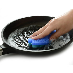 Norpro Fish Silicone Dish Brush used for vegetables, removes corn threads.