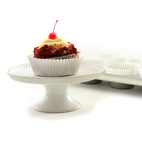 Norpro giant muffin cups white in use, large size for jumbo treats.