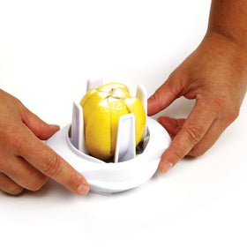 Norpro lemon-lime slicer creates uniform potato wedges quickly.