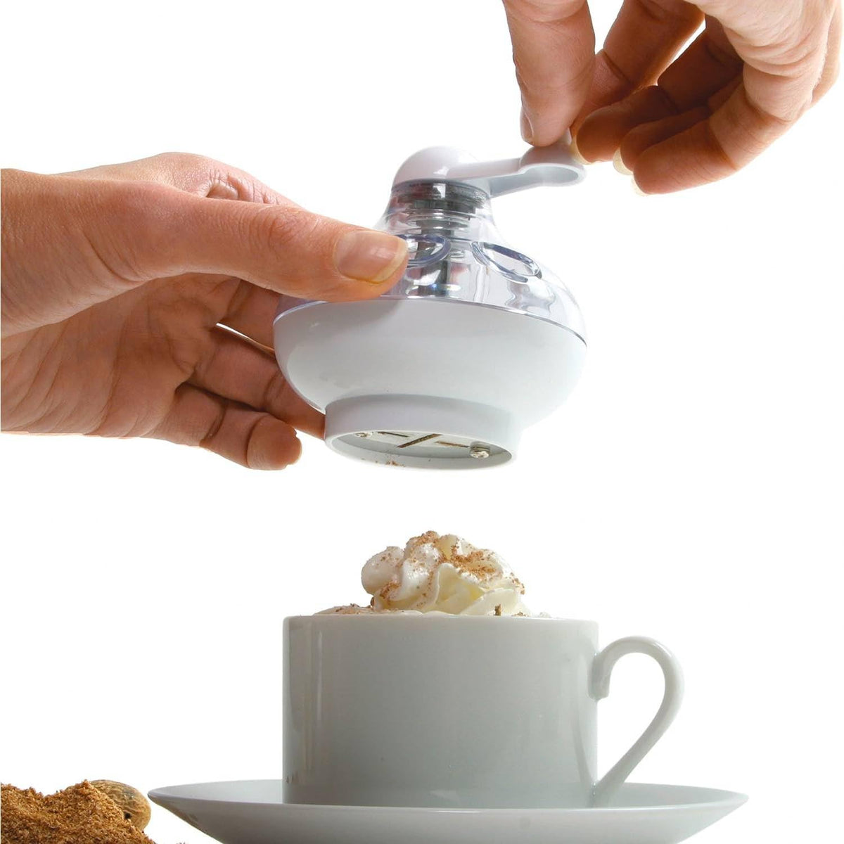 Norpro Nutmeg Grinder in use, showing effortless grinding