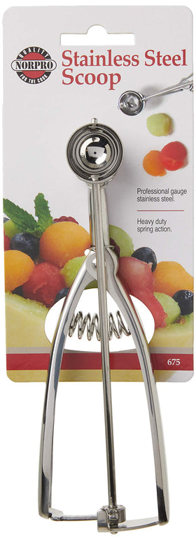 Norpro spring-action scoop shown in use for easy dough release