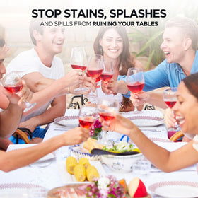 NORZEE white disposable tablecloth protecting surfaces from spills.