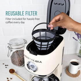 Nostalgia Classic Coffee Maker anti-drip pause supports mess-free pouring during brewing.
