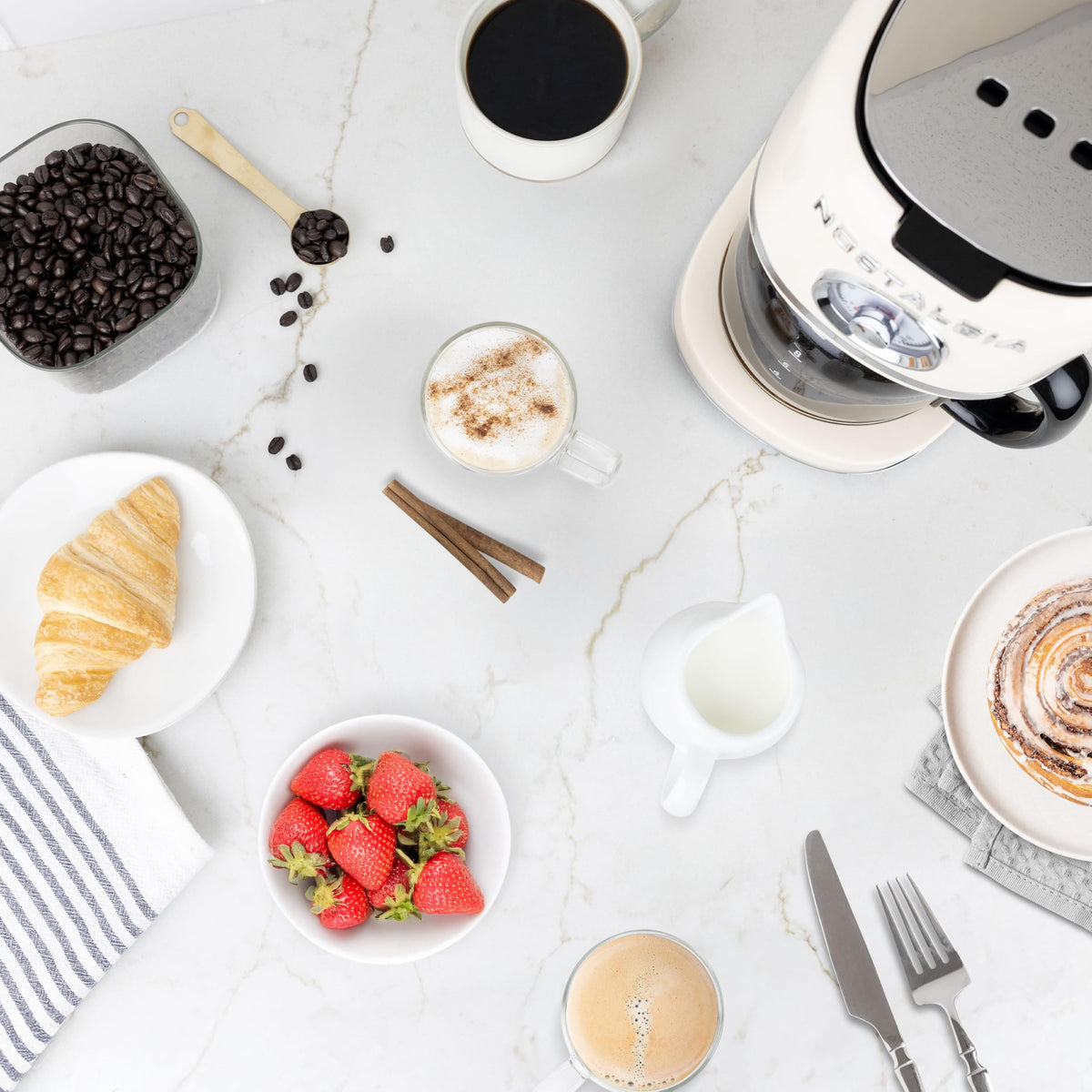 Nostalgia Classic Coffee Maker shows one-button brew for quick mornings.