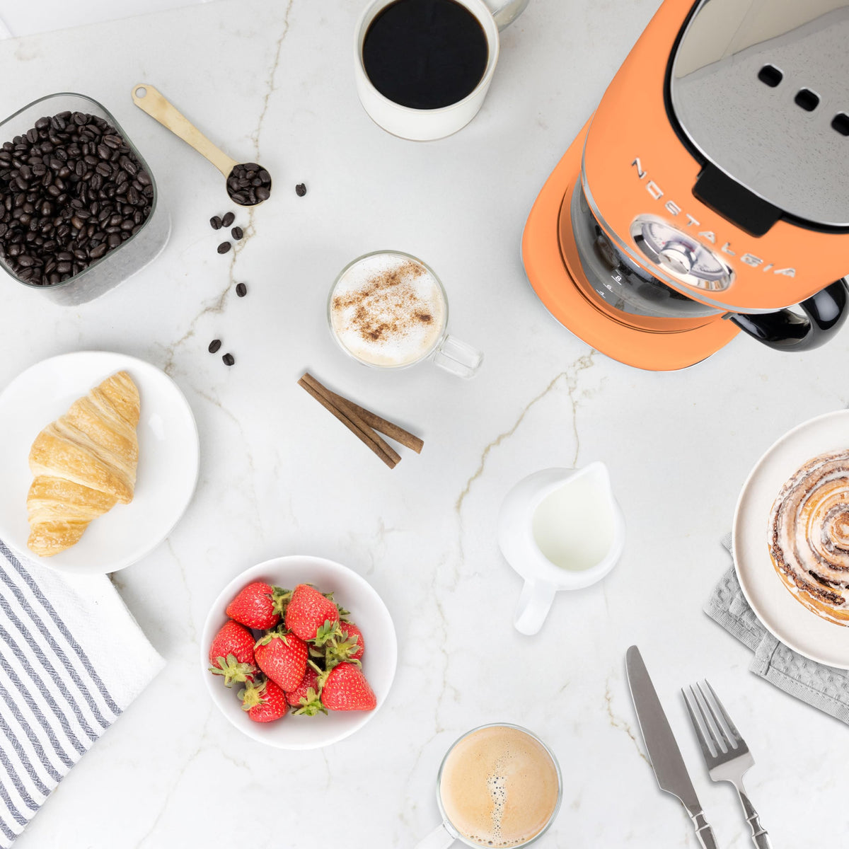 Nostalgia Classic Retro coffee maker in action, showcasing simple button operation for fast mornings.