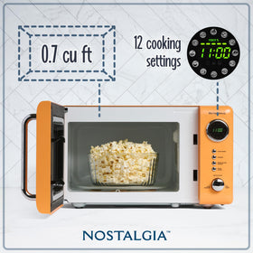 Nostalgia orange interior clean design for quick, hygienic microwave maintenance.