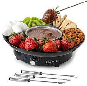 Nostalgia electric fondue pot 10oz glowing with heat for cheese and chocolate dipping