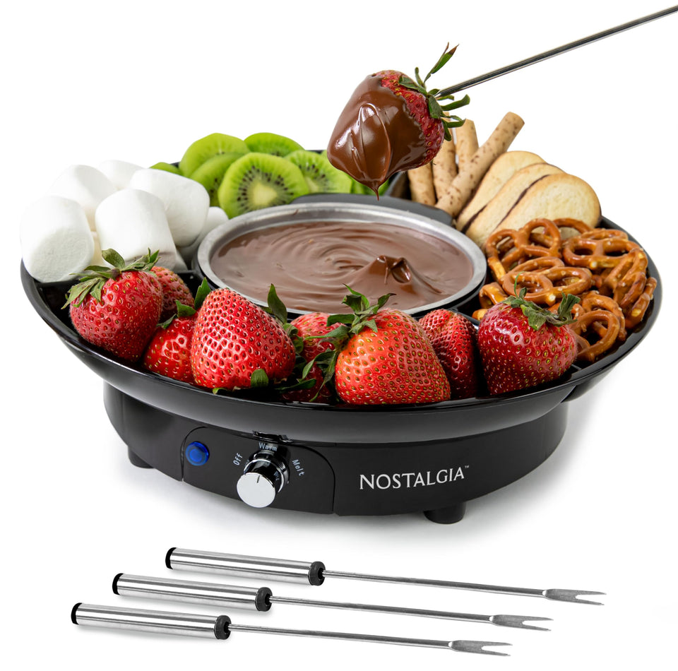 Nostalgia electric fondue pot 10oz glowing with heat for cheese and chocolate dipping
