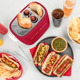 Slide-out drip tray in the Nostalgia hot dog toaster for easy cleanup