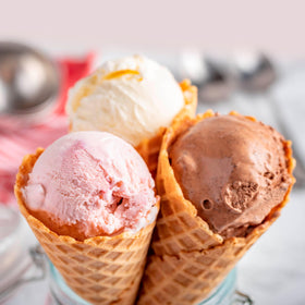 Nostalgia ice cream maker with portable handle for easy transport.