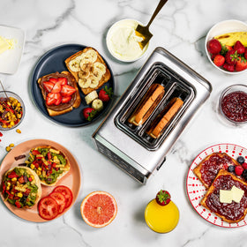 Nostalgia Inspirex removable crumb tray for easy cleanup after toasting