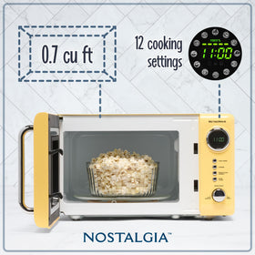 Nostalgia NRMO7YW6A digital LED display highlights easy monitoring while cooking.