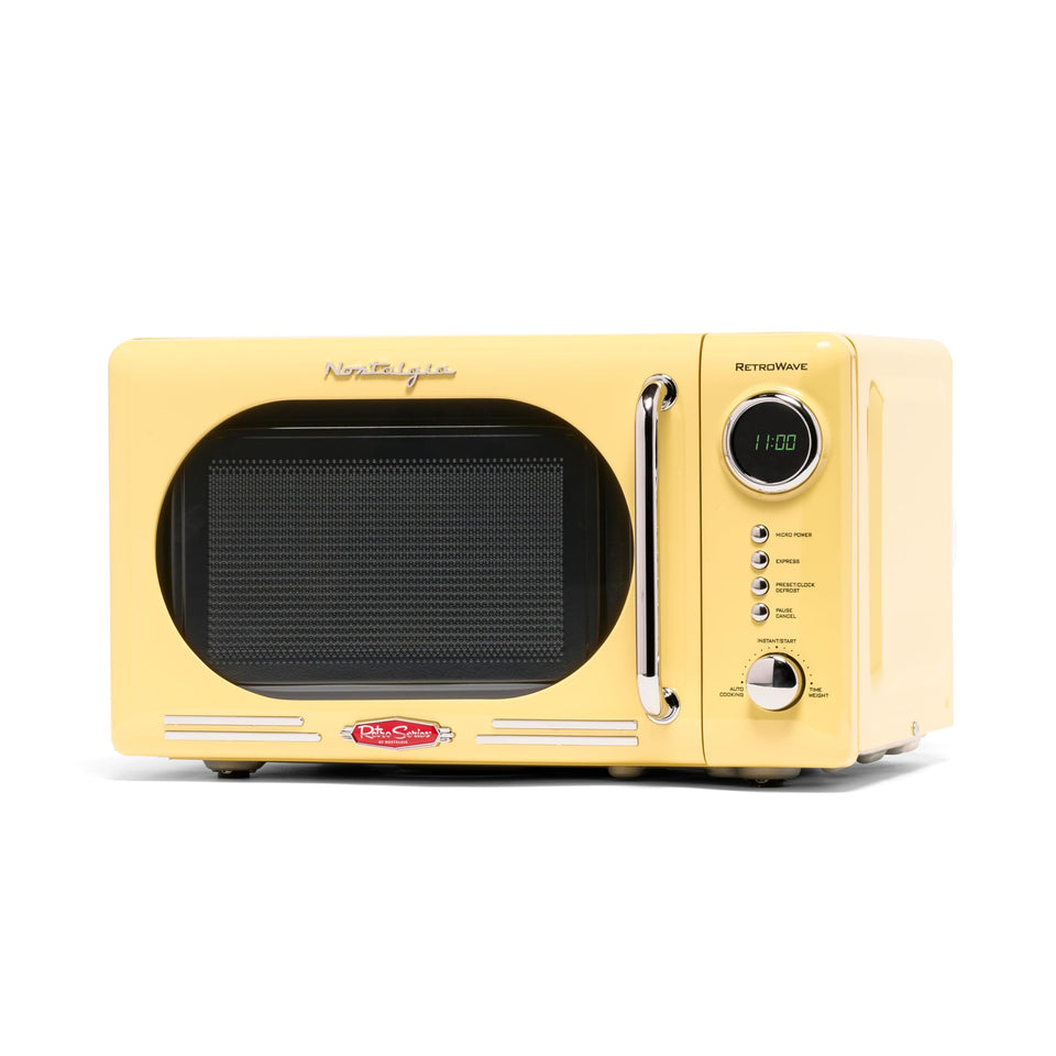 Nostalgia NRMO7YW6A retro microwave front view showing compact design for small kitchens.