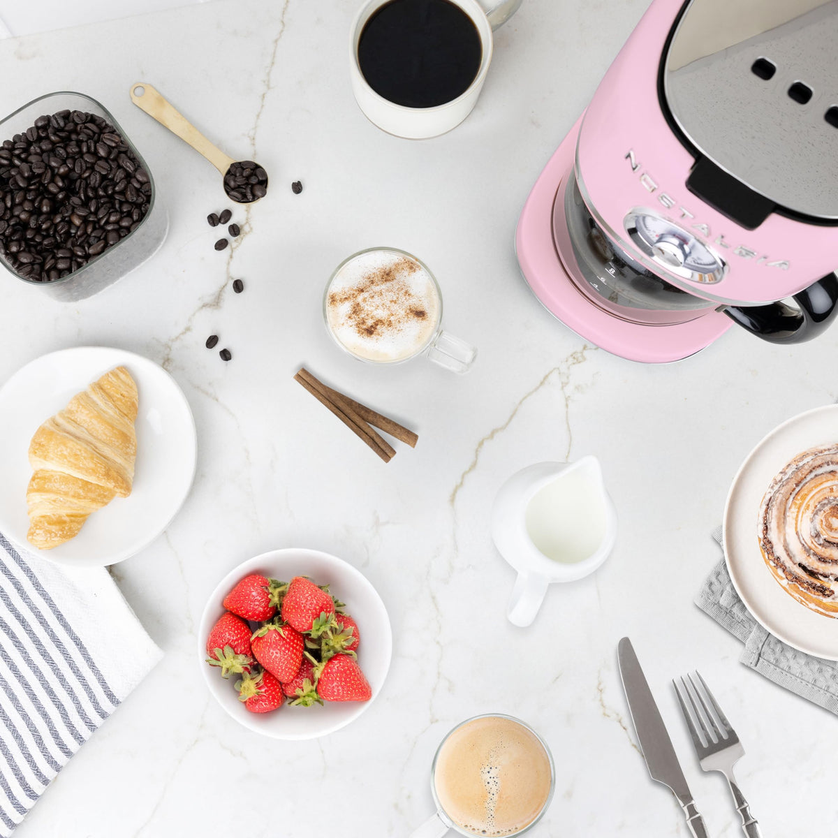 Nostalgia one-button-brew enables quick, hassle-free coffee starts.