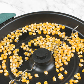 Nostalgia popcorn maker cool-touch handles for safe handling.