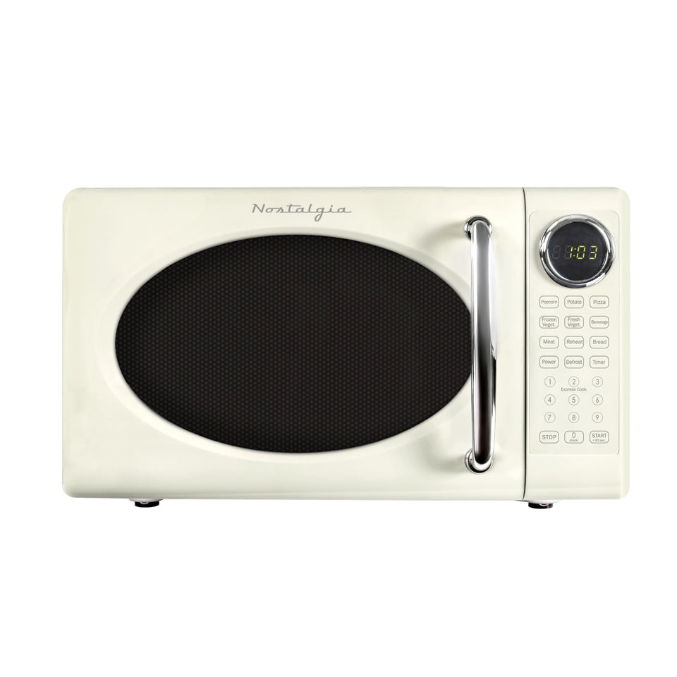 Nostalgia Retro 700W microwave front view in ivory, ideal for compact kitchens.