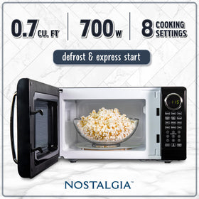 Nostalgia retro microwave control panel close-up showing easy time and power settings.