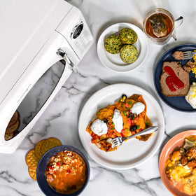 Nostalgia retro microwave oven digital clock adds modern convenience to a vintage unit.