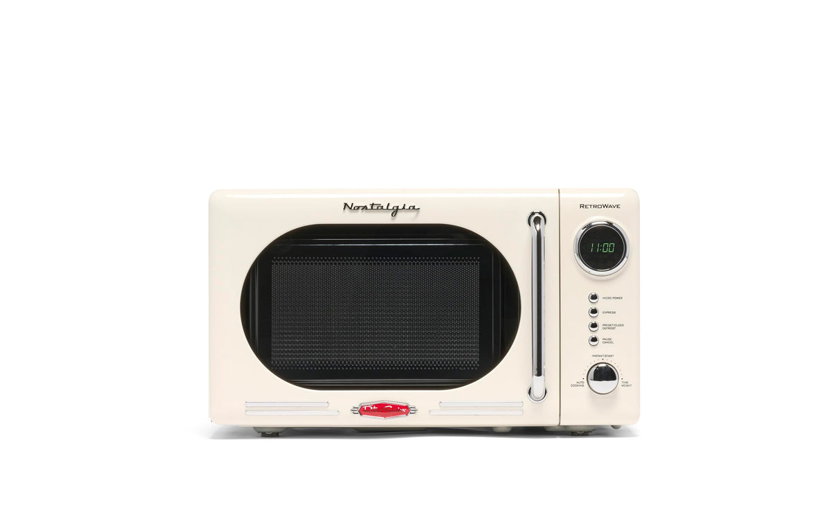 Nostalgia retro microwave ivory front view, compact countertop.