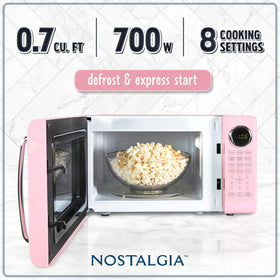 Nostalgia compact microwave oven 0.7 cu ft for small spaces and quick reheats