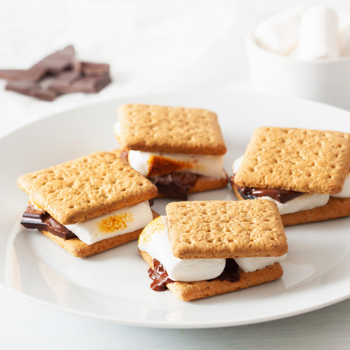 Nostalgia Smores Maker easy-clean base and removable trays for quick cleanup.