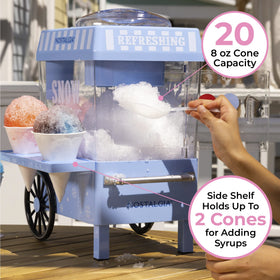 Nostalgia snow cone machine in action shaving ice for fluffy cones.