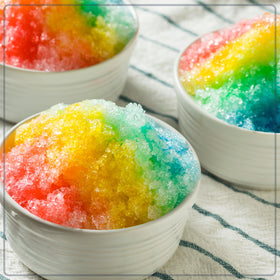Nostalgia Snow Cone Machine with reusable cup for easy serving