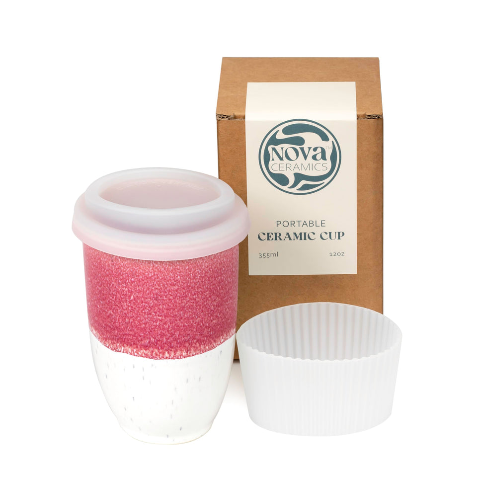 Nova Ceramics coffee travel mug in coral pink glaze, preserving flavor on the go