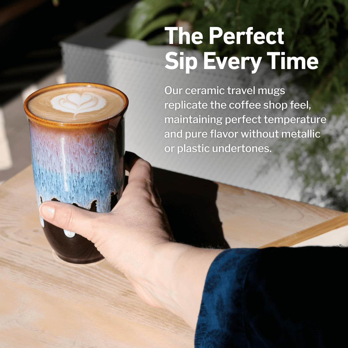Nova Ceramics coffee tumbler held in hand, ideal for commutes and quick breaks.