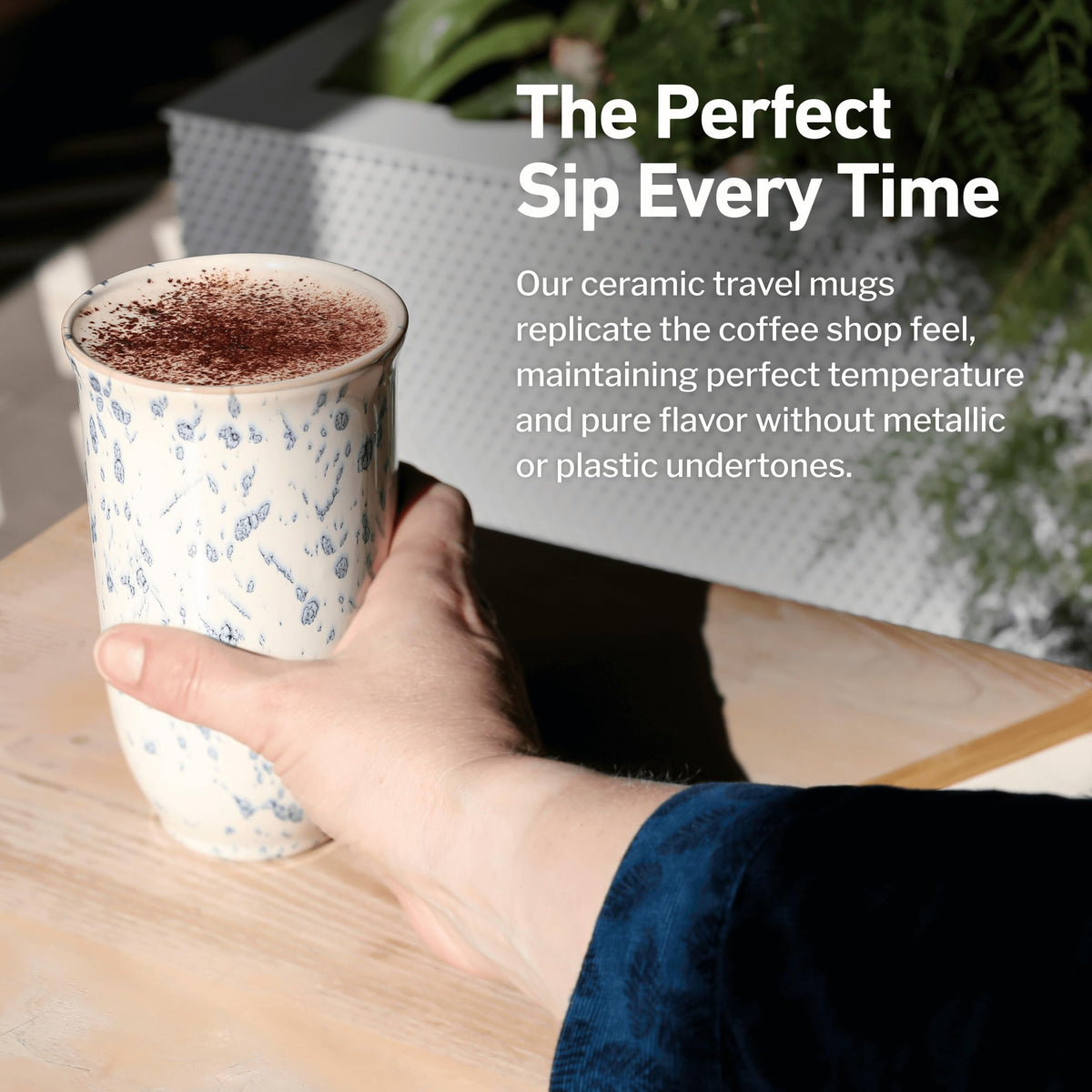 NOVA CERAMICS Orchid design held in hand, showcasing ergonomic shape.