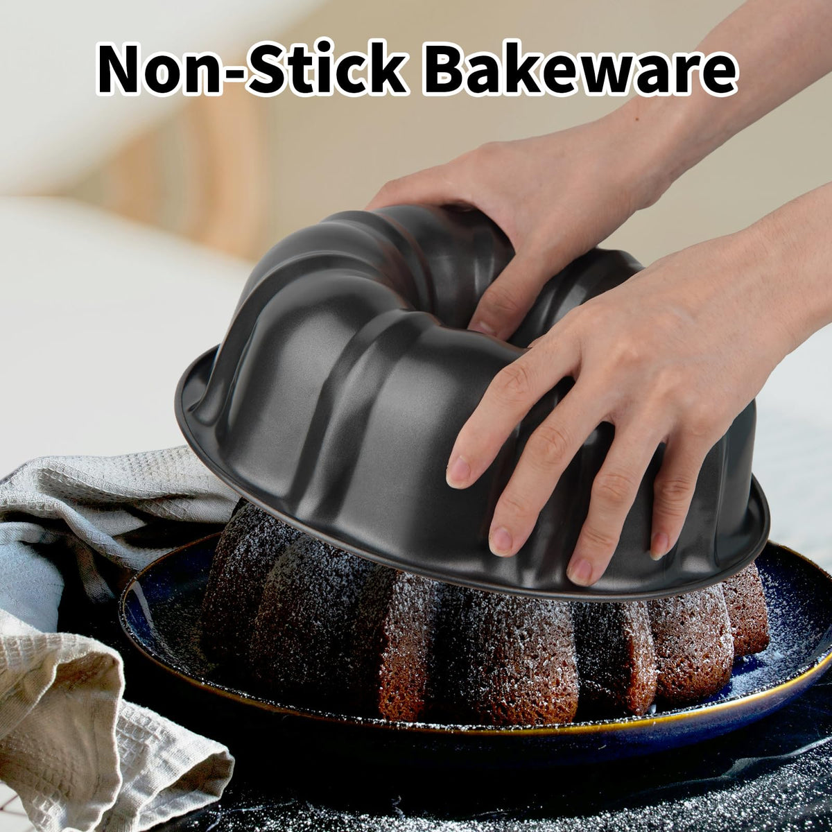 Novery round cake pan with large center tube promotes even heat distribution.