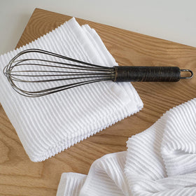 Now Designs Ripple White towel set drying on rack after washing