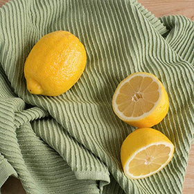 Now Designs Ripple towel adds subtle sage color to kitchen decor.