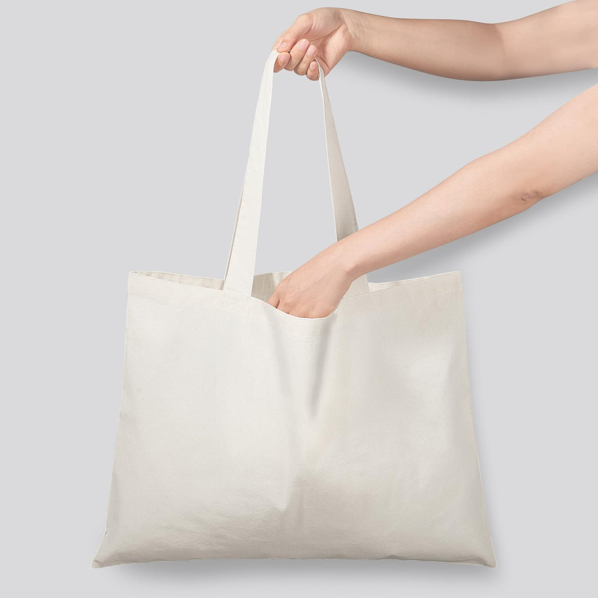 NPBAG tote side view highlighting long handles for shoulder use