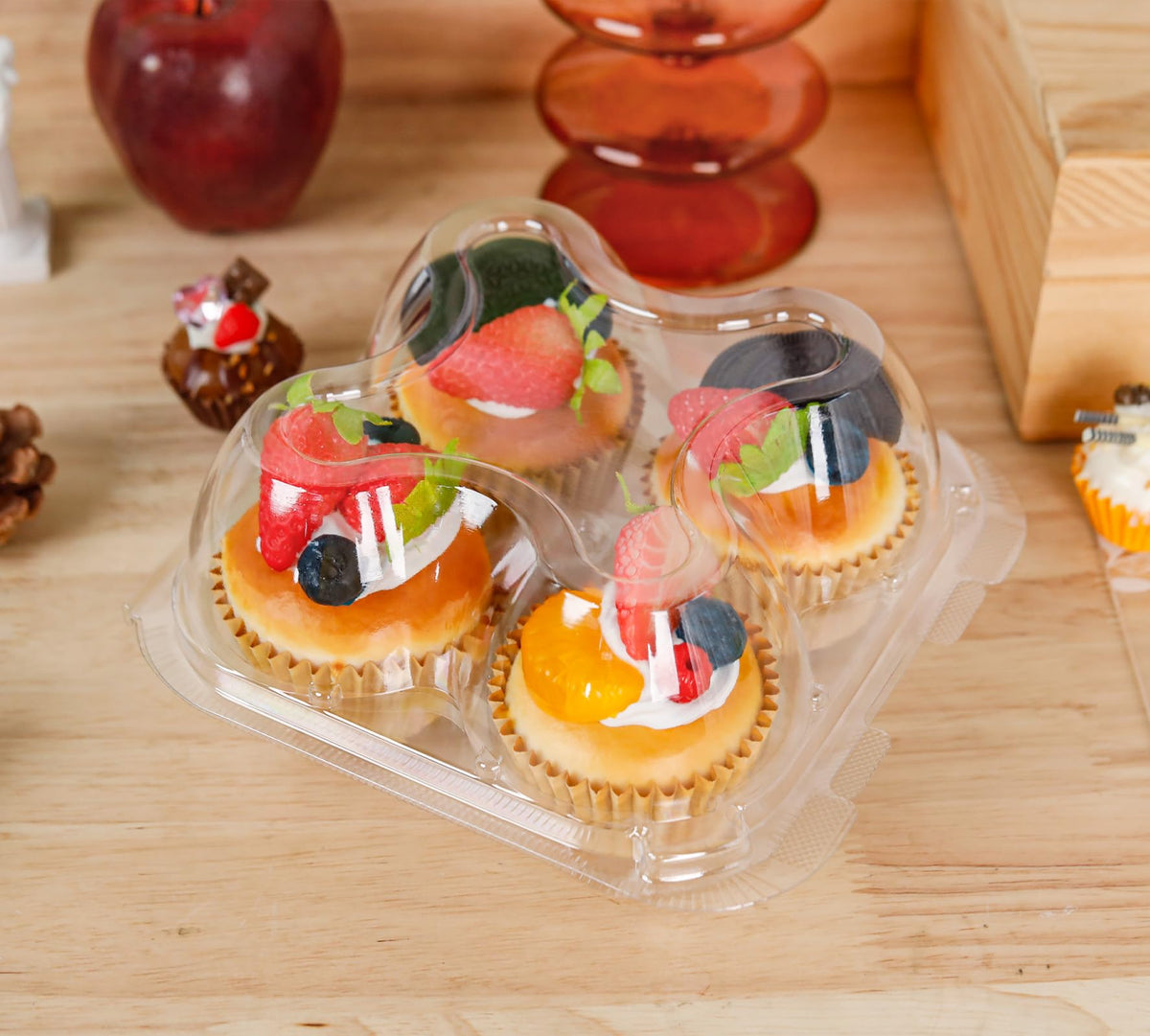 NPLUX standard-size cupcake boxes fit typical cupcakes.