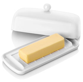 Nucookery porcelain butter dish with lid on countertop keeps butter fresh.
