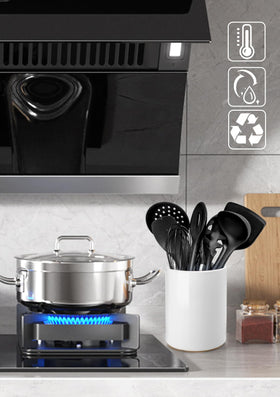 Nucookery ceramic utensil holder stays stable on the counter for quick access.