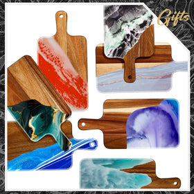 Nuenen acacia cutting board with handle meal prep station in use.