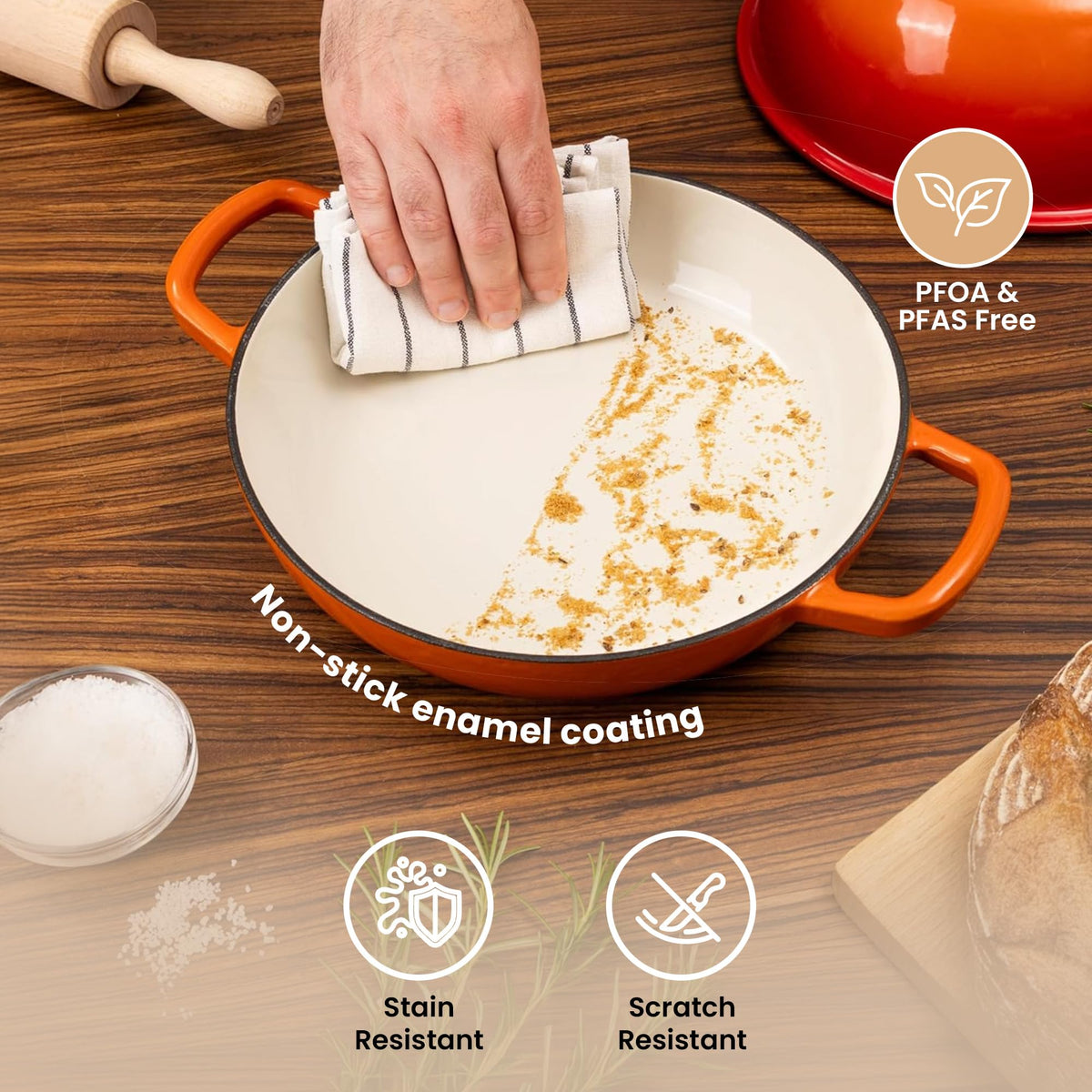 Nuovva orange six-quart Dutch oven on counter as stylish kitchen piece.