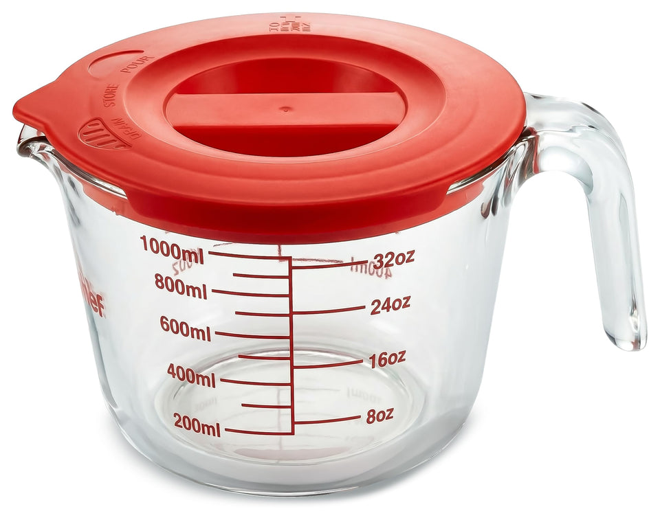 NutriChef glass measuring cup with lid showing 4-cup capacity and clear scale for precise measuring.