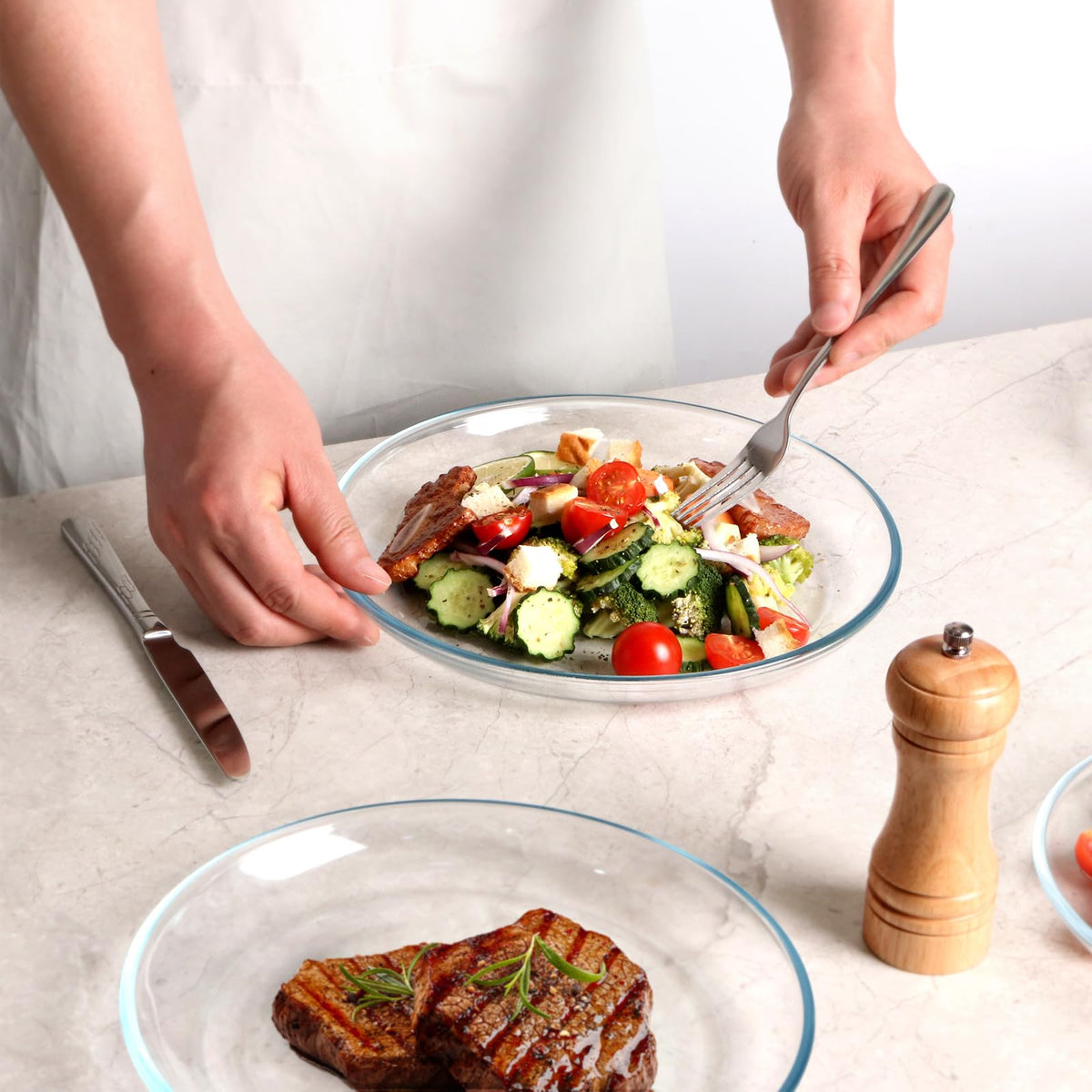 Nutriups multipurpose plate for pasta, pizza, and sandwiches with raised edges to catch sauces.
