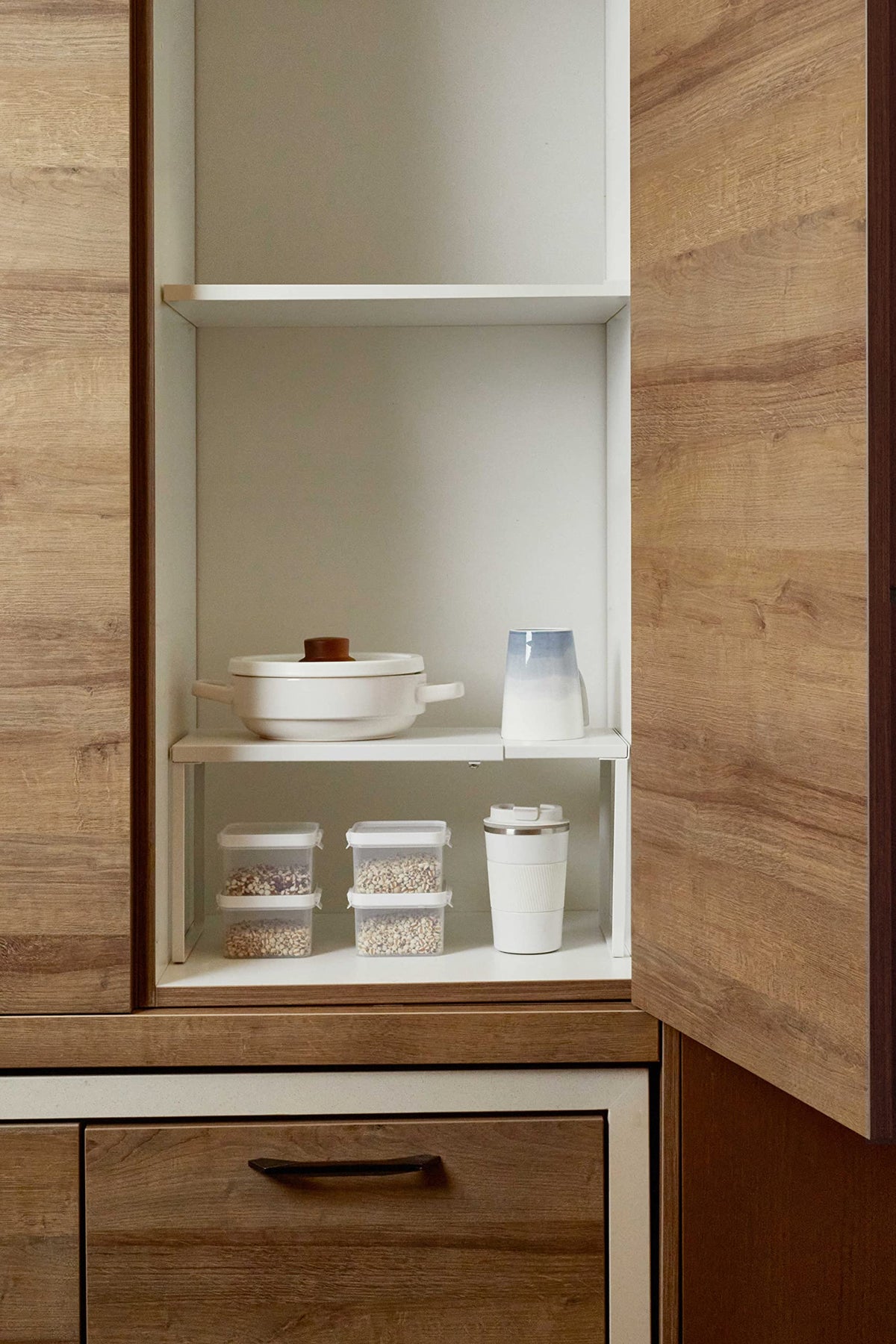 Nxconsu two-tier setup illustrates expanded storage capacity with two expandables.