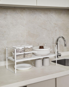 Nxconsu stackable storage rack doubles your shelving capacity.