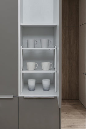 Nxconsu under-sink organization keeps items accessible.