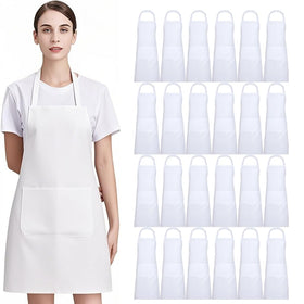 Nymmoata white apron with front pockets keeps utensils close and hands free.