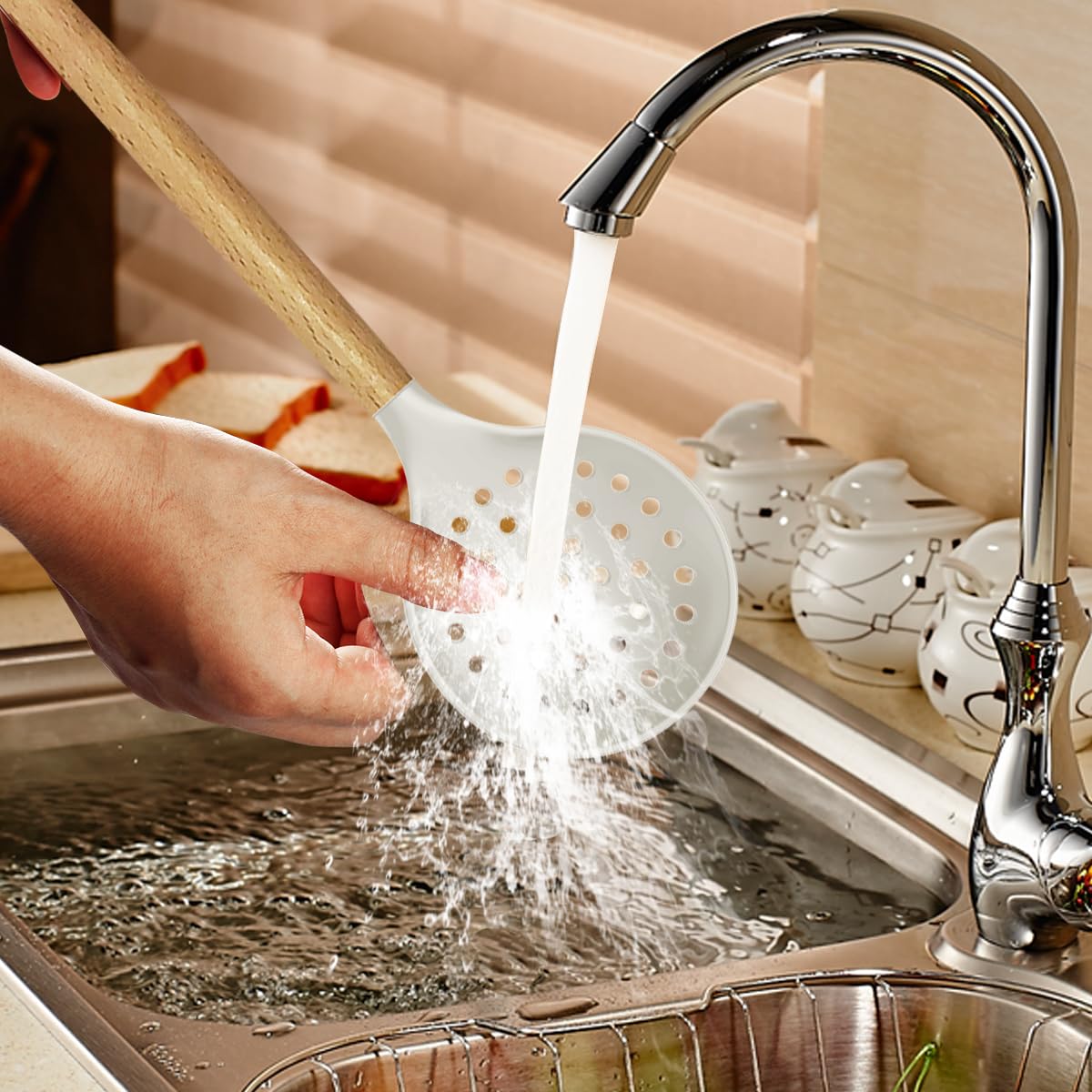 oannao cream white wooden-handled detail shows comfortable grip during cooking