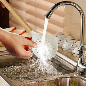 oannao cream white wooden-handled detail shows comfortable grip during cooking