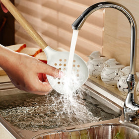 oannao silicone utensils ladle ideal for soups and stews with safe grip.