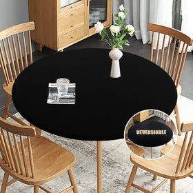 Obstal fitted round table cloth demonstrating elastic stretch for a secure round-table fit.