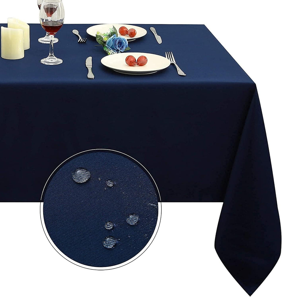 Obstal navy rectangle tablecloth with lush drape for elegant indoor dining